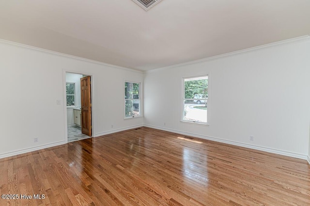 180 Frye Rd, Pinehurst, NC 28374 - unfurnished room with crown molding, wood finished floors, and baseboards