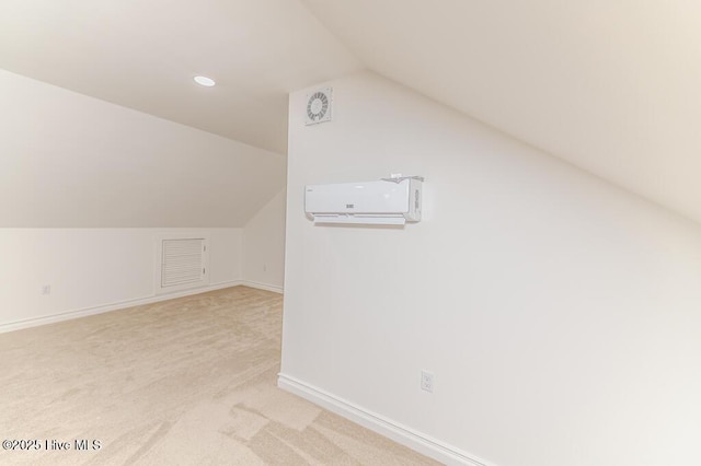 180 Frye Rd, Pinehurst, NC 28374 - additional living space with lofted ceiling, light colored carpet, baseboards, recessed lighting, and a wall mounted AC