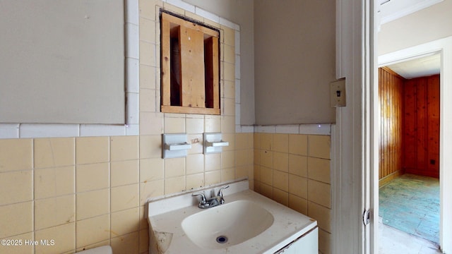 half bathroom featuring vanity
