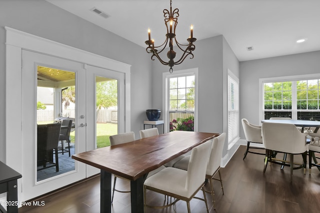 5606 Swiss Stone Ct, Wilmington, NC 28412 - dining room with dark wood finished floors, a chandelier, french doors, and recessed lighting