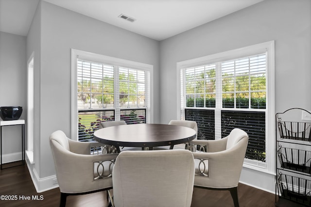 5606 Swiss Stone Ct, Wilmington, NC 28412 - dining space with dark wood finished floors and baseboards