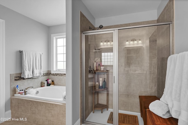 5606 Swiss Stone Ct, Wilmington, NC 28412 - full bathroom with a shower stall and a bath