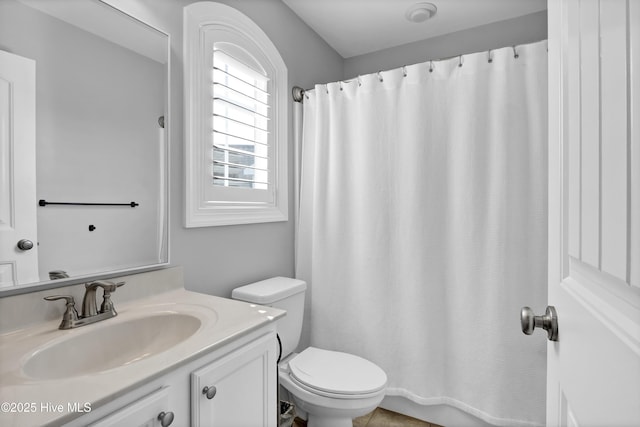 5606 Swiss Stone Ct, Wilmington, NC 28412 - full bath featuring toilet, vanity, and a shower with curtain