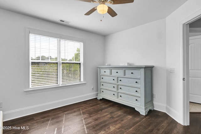 5606 Swiss Stone Ct, Wilmington, NC 28412 - bedroom featuring dark wood-type flooring, baseboards, and a ceiling fan