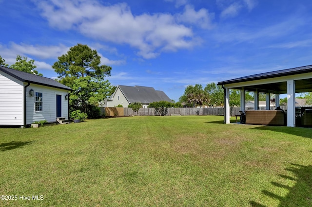5606 Swiss Stone Ct, Wilmington, NC 28412 - view of yard with entry steps and an outdoor hangout area