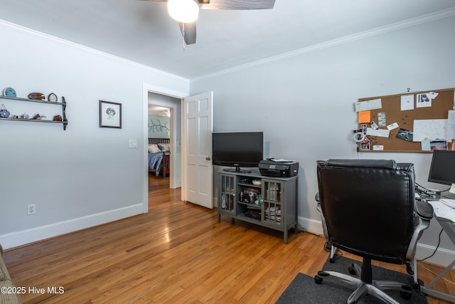 office featuring ornamental molding, ceiling fan, wood finished floors, and baseboards
