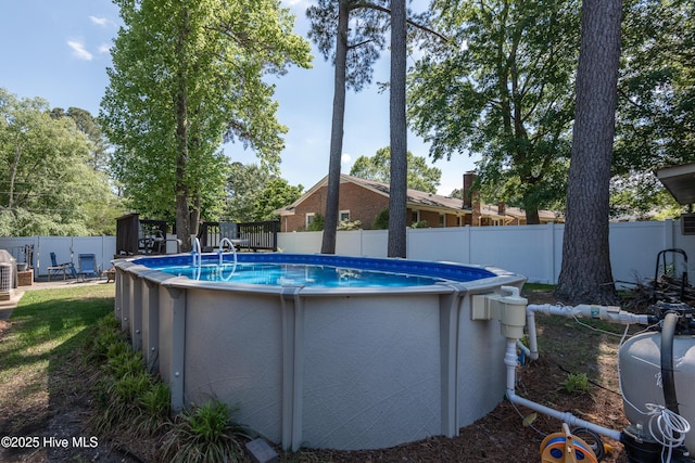 view of pool featuring a fenced backyard