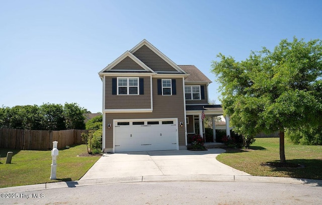 view of front of property with concrete driveway, a garage, and covered porch