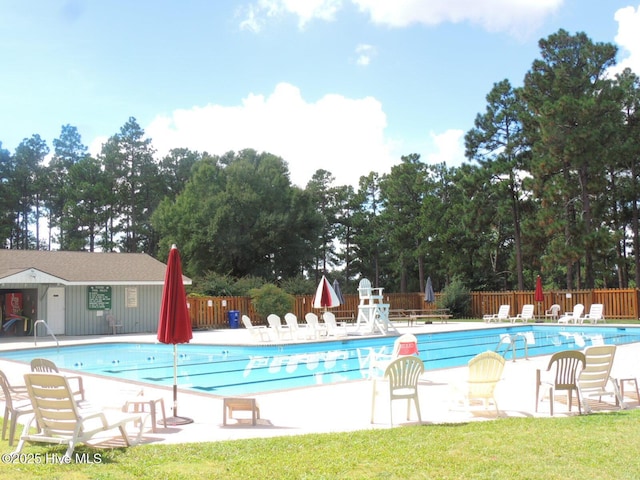 1 Eliot Ct, Jackson Springs, NC 27281 - community pool featuring view of scattered trees and a patio