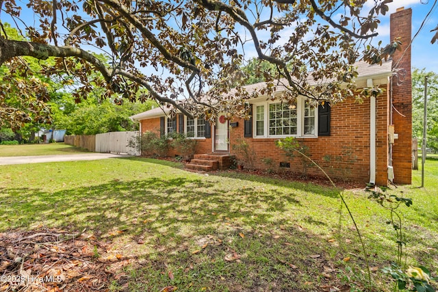 113 S Canal St, Whiteville, NC 28472 - single story home with brick siding, crawl space, and a chimney