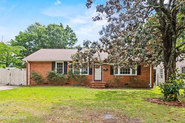 113 S Canal St, Whiteville, NC 28472 - view of front of property with entry steps, brick siding, a gate, and a front lawn