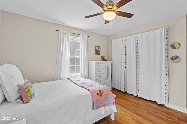 113 S Canal St, Whiteville, NC 28472 - bedroom featuring wood finished floors, a ceiling fan, and baseboards