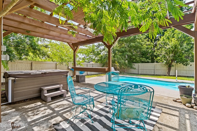 113 S Canal St, Whiteville, NC 28472 - view of patio / terrace with a hot tub, a fenced backyard, and a pergola