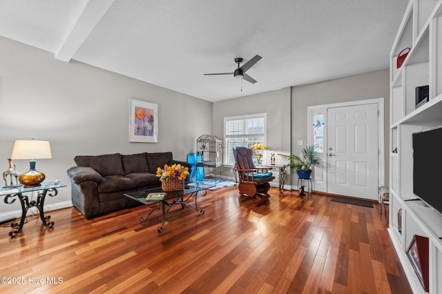 171 Adams Ln, Washington, NC 27889 - living room with ceiling fan, wood finished floors, baseboards, and a textured ceiling