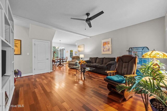 171 Adams Ln, Washington, NC 27889 - living room with ceiling fan, hardwood / wood-style floors, and a chandelier