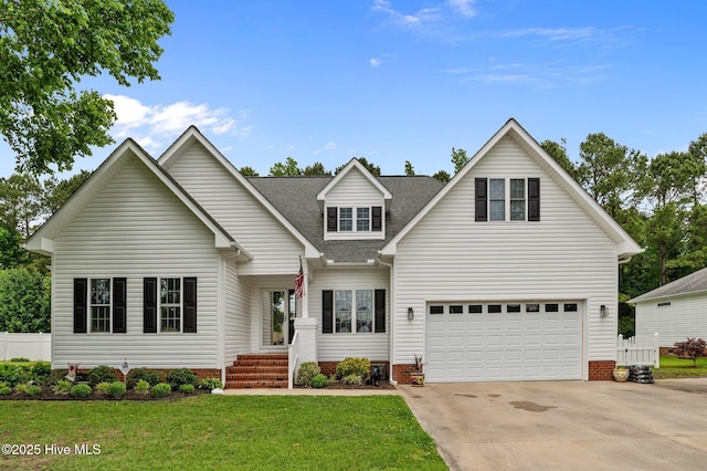 171 Adams Ln, Washington, NC 27889 - traditional home featuring roof with shingles, driveway, and a garage