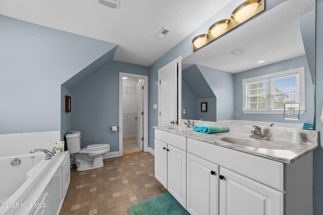 171 Adams Ln, Washington, NC 27889 - bathroom with toilet, double vanity, a spacious closet, a bath, and baseboards