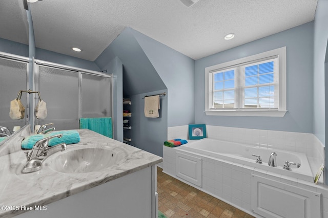 171 Adams Ln, Washington, NC 27889 - full bath with a shower stall, a textured ceiling, a garden tub, vanity, and recessed lighting