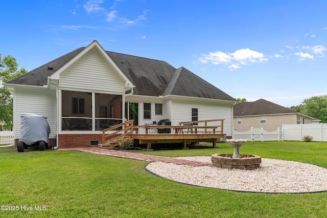 171 Adams Ln, Washington, NC 27889 - back of property featuring a sunroom, a deck, and a shingled roof
