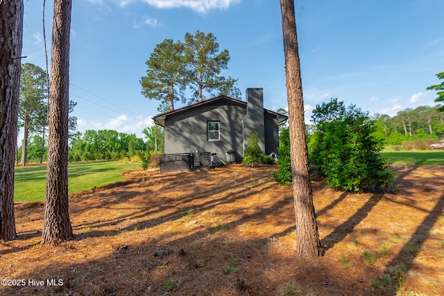 229 Rays Bridge Rd, Whispering Pines, NC 28327 - view of front of house with a chimney