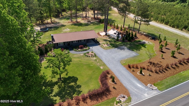 229 Rays Bridge Rd, Whispering Pines, NC 28327 - aerial view of property and surrounding area with a forest