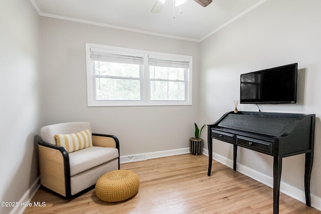 229 Rays Bridge Rd, Whispering Pines, NC 28327 - sitting room with crown molding, wood finished floors, a ceiling fan, and baseboards