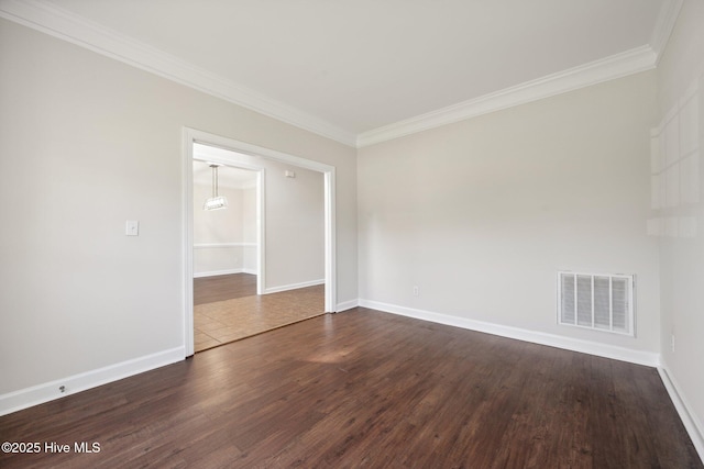 870 Wine Cellar Cir, Wilmington, NC 28411 - empty room featuring ornamental molding, dark wood-type flooring, and baseboards