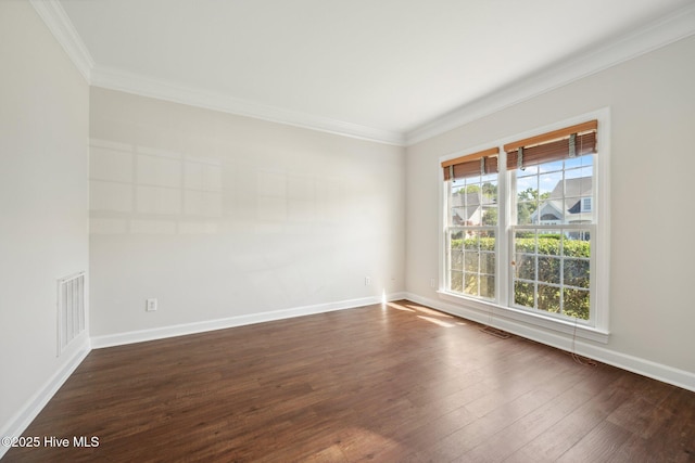 870 Wine Cellar Cir, Wilmington, NC 28411 - empty room with ornamental molding, dark wood finished floors, and baseboards