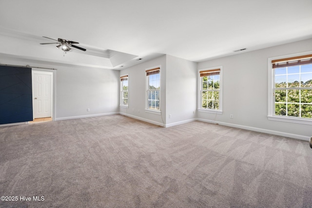 870 Wine Cellar Cir, Wilmington, NC 28411 - carpeted empty room with baseboards, healthy amount of natural light, and ceiling fan