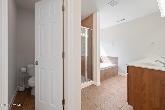 870 Wine Cellar Cir, Wilmington, NC 28411 - bathroom with a bath, a stall shower, toilet, and vanity