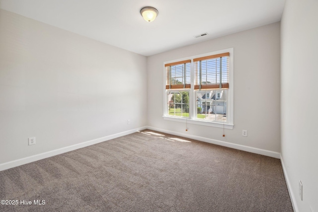 870 Wine Cellar Cir, Wilmington, NC 28411 - carpeted spare room featuring baseboards