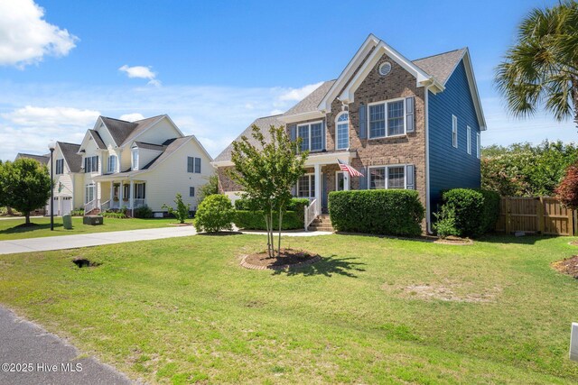 870 Wine Cellar Cir, Wilmington, NC 28411 - traditional-style home with brick siding
