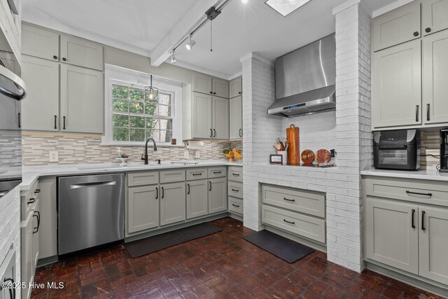 224 Westview Park Dr, Rocky Mount, NC 27804 - kitchen with dishwasher, wall chimney exhaust hood, a sink, decorative backsplash, and light countertops