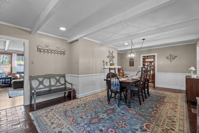 224 Westview Park Dr, Rocky Mount, NC 27804 - dining space featuring beamed ceiling, wood finished floors, a wainscoted wall, a chandelier, and ornamental molding