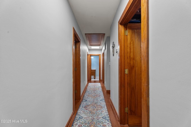 224 Westview Park Dr, Rocky Mount, NC 27804 - hallway with attic access and baseboards