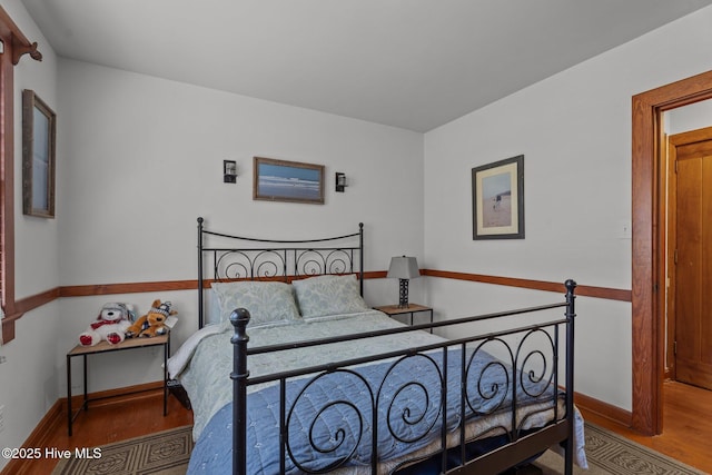 224 Westview Park Dr, Rocky Mount, NC 27804 - bedroom with wood finished floors and baseboards