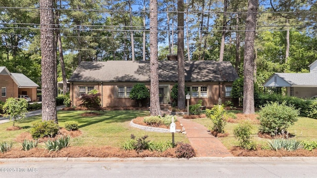 224 Westview Park Dr, Rocky Mount, NC 27804 - single story home with a front lawn and brick siding