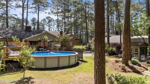 224 Westview Park Dr, Rocky Mount, NC 27804 - swimming pool featuring a lawn and a deck