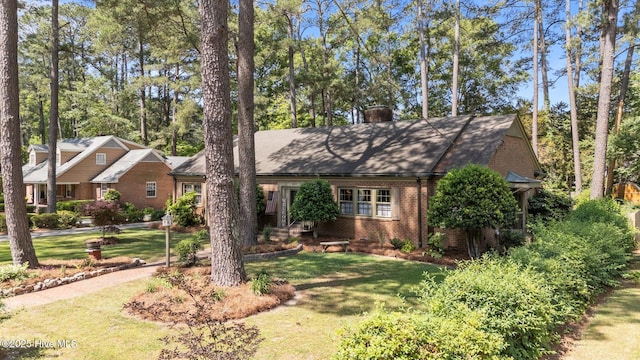224 Westview Park Dr, Rocky Mount, NC 27804 - ranch-style house featuring brick siding, a front lawn, and a chimney
