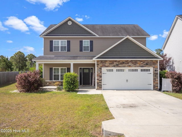 view of front of home with concrete driveway, a garage, stone siding, and a porch