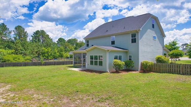 107 Meadowview Pl, Whispering Pines, NC 28327 - back of house with a fenced backyard and a sunroom