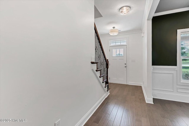 107 Meadowview Pl, Whispering Pines, NC 28327 - entrance foyer featuring ornamental molding, stairs, and dark wood-style flooring