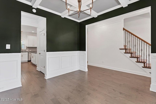 107 Meadowview Pl, Whispering Pines, NC 28327 - unfurnished room featuring a chandelier, beam ceiling, coffered ceiling, dark wood-type flooring, and stairway