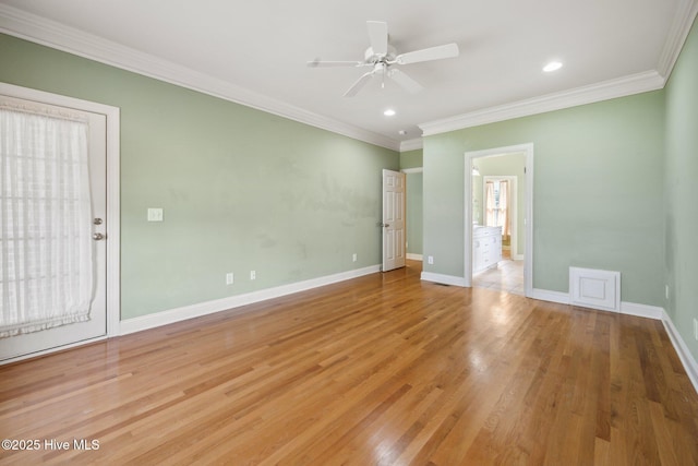 empty room featuring ceiling fan, baseboards, crown molding, light wood-style flooring, and recessed lighting