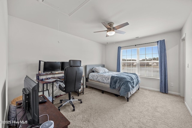 bedroom featuring attic access, carpet floors, baseboards, and an office area