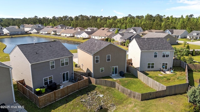 aerial view of residential area with a nearby body of water