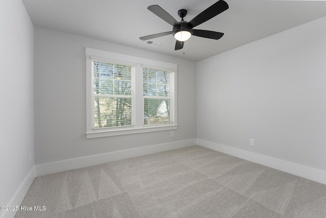 778 Hollybriar Loop Rd SE, Bolivia, NC 28422 - carpeted spare room featuring baseboards and ceiling fan