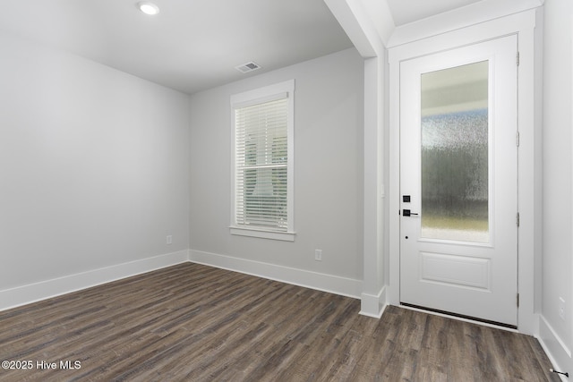 778 Hollybriar Loop Rd SE, Bolivia, NC 28422 - entryway featuring dark wood-style flooring, baseboards, and recessed lighting