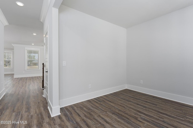 778 Hollybriar Loop Rd SE, Bolivia, NC 28422 - unfurnished room featuring baseboards, dark wood finished floors, recessed lighting, and ornamental molding