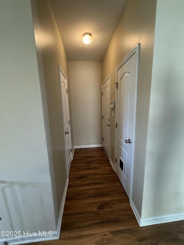 209 Merin Height Rd, Jacksonville, NC 28546 - corridor with dark wood-style floors and baseboards
